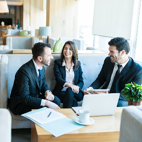people sat on a sofa